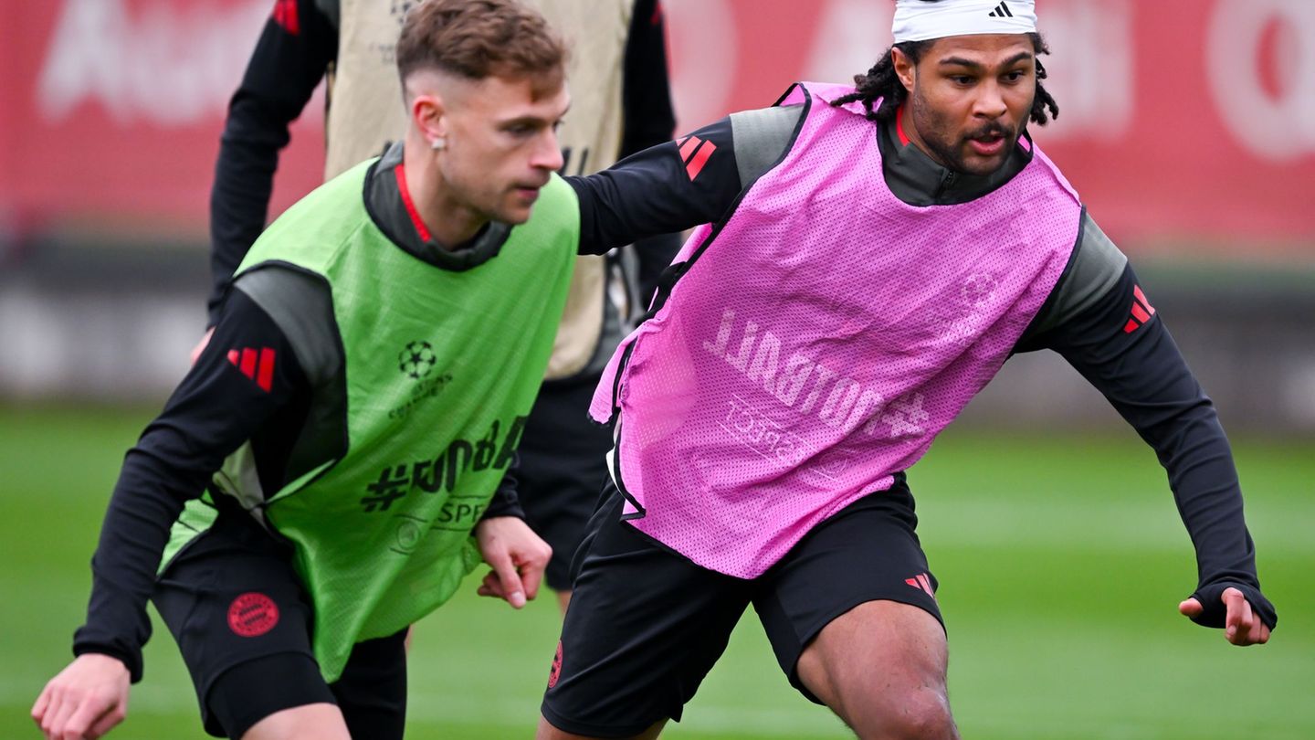 Joshua Kimmich (l) und Serge Gnabry in Aktion beim Abschlusstraining. Foto: Sven Hoppe/dpa