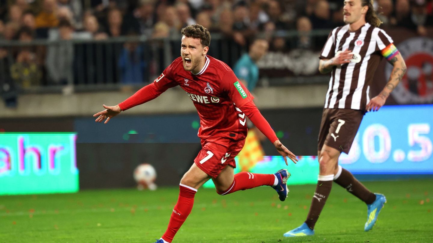 Luca Waldschmid (l, 1. FC Köln) jubelt nach dem Ausgleichstreffer. Foto: Christian Charisius/dpa