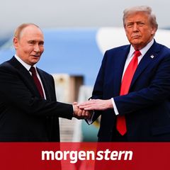 Trump und Putin schütteln Hände