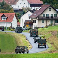 Donald Trump will 5000 Soldaten abziehen: US-Fahrzeuge auf deutscher Straße