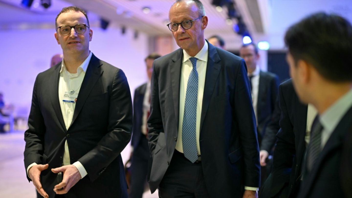 CDU-Politiker Spahn (l.) und Merz