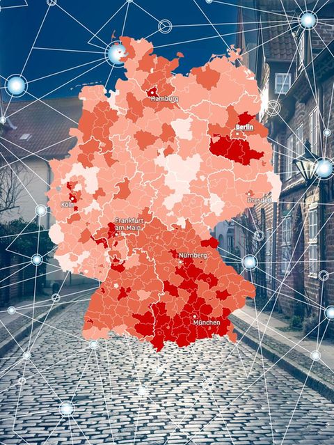 Eine Montage mit einer Deutschland-Karte und einer dörflichen Strasse im Hintergrund
