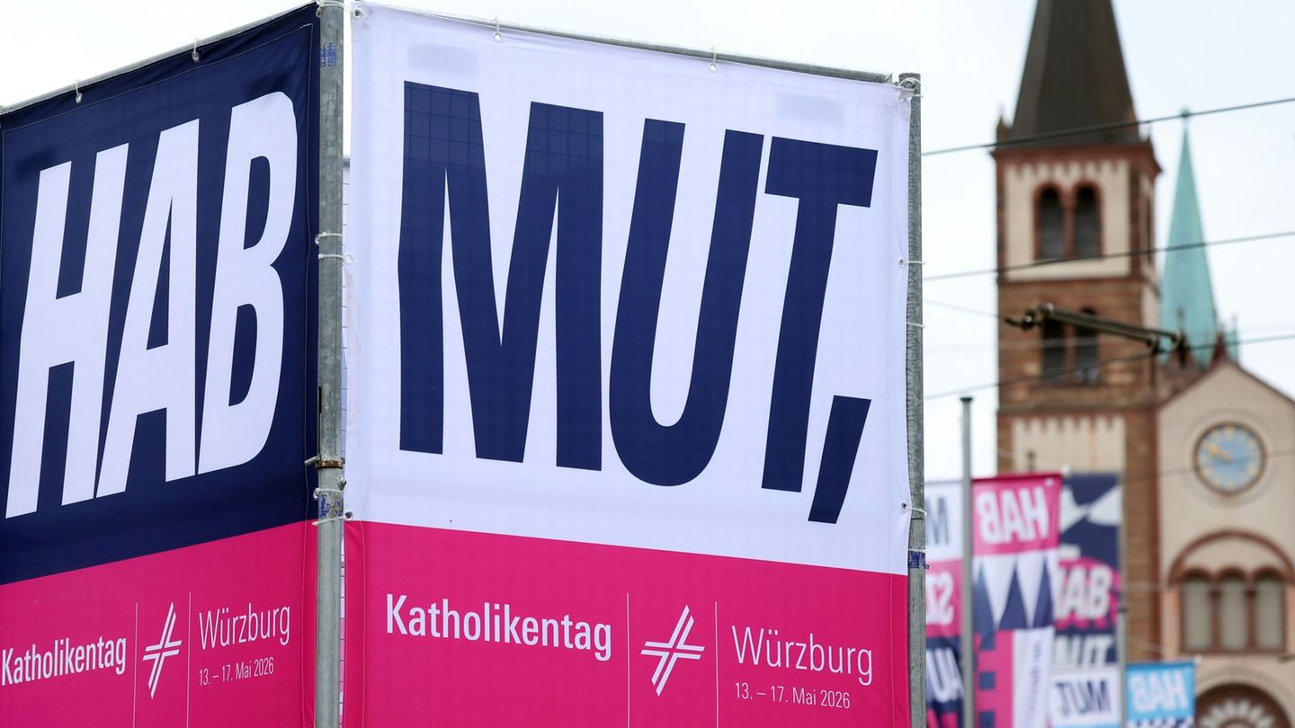 Der Bundespräsident mischt sich in Würzburg unters Volk. Foto: Karl-Josef Hildenbrand/dpa