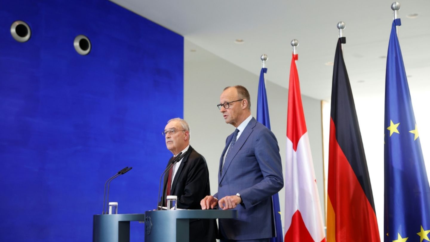Friedrich Merz (r) und Guy Parmelin
