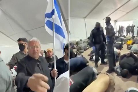 Israel-Minister (l.) zeigt auf kniende Gaza-Aktivisten (r.)