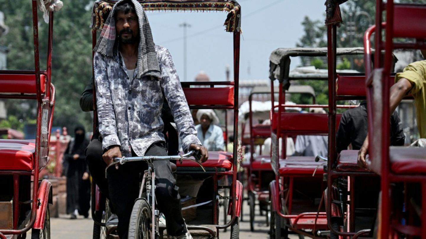 Rikscha-Fahrer in Neu Delhi