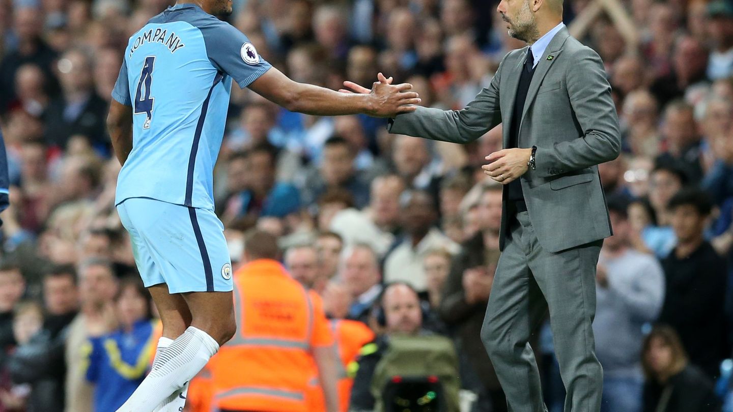 Vincent Kompany (l) war Pep Guardiolas Kapitän bei Manchester City. (Archivbild) Foto: Martin Rickett/Press Association/dpa