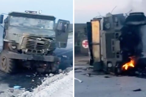 Ein russisches Militärfahrzeug steht in Flammen.