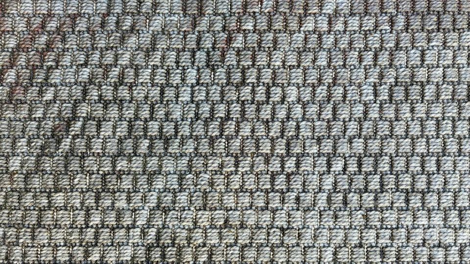 ein dreckiger Outdoor Teppich