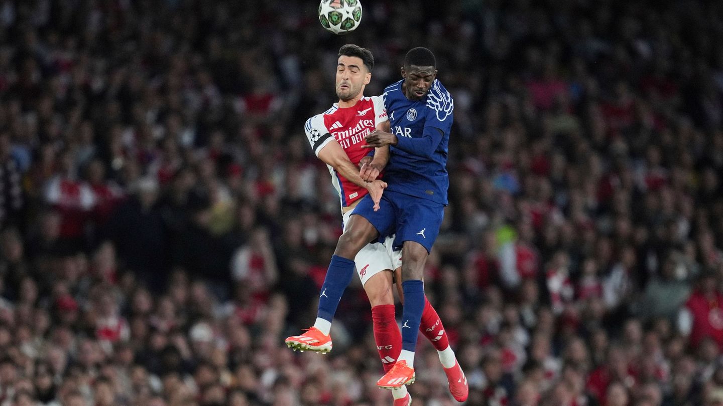 Treffen am Samstag erneut aufeinander: Arsenals Mikel Merino und Ousmane Dembele (r) von PSG. (Archivbild) Foto: Kin Cheung/AP/d