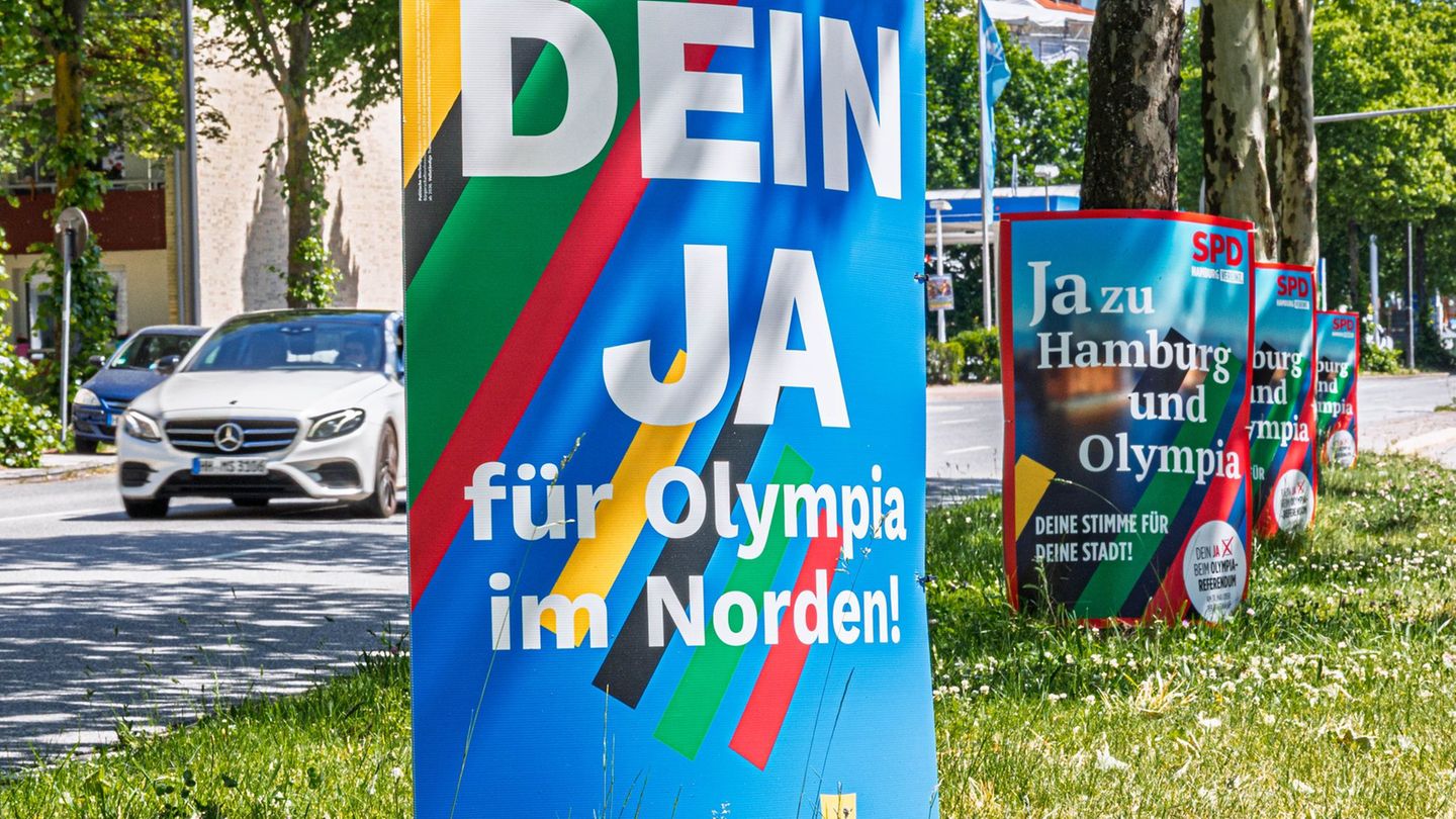 Die Plakate der Olympia-Befürworter sind überall in Hamburg zu sehen. Foto: Markus Scholz/dpa