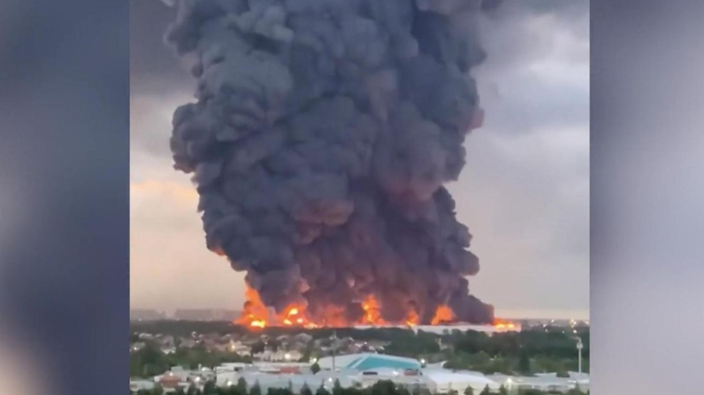 A column of fire and smoke several meters high rises over Russia.