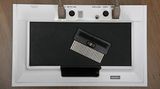 Die "Odyssey" von oben. Die Software wurde auf Steckmodulen ausgeliefert (im Bild mit der Nummer 3). Mit den Knöpfen oben ließen sich die Mittellinie - das Netz beim Tischtennis - verschieben (abhängig von der TV-Größe) und das Spieltempo regulieren