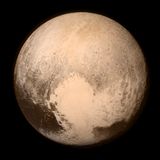 Der Pluto als beige-braune Kugel