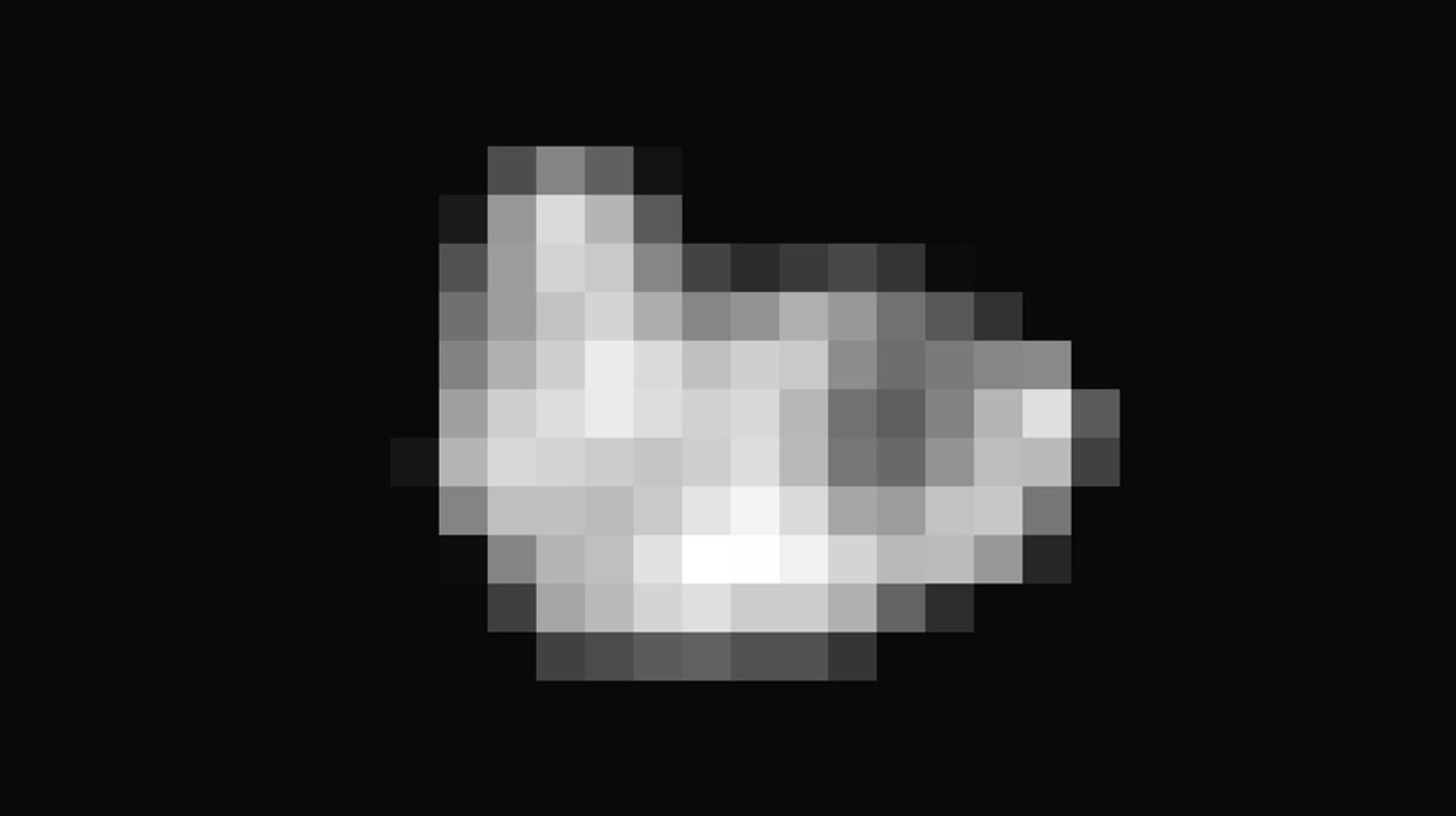 Fotos von Pluto - Aufnahmen der New Horizons Sonde Grob-pixeliges Bild von Pluto-Mond Hydra