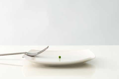 Veganerin: Ein Teller mit einer Erbse