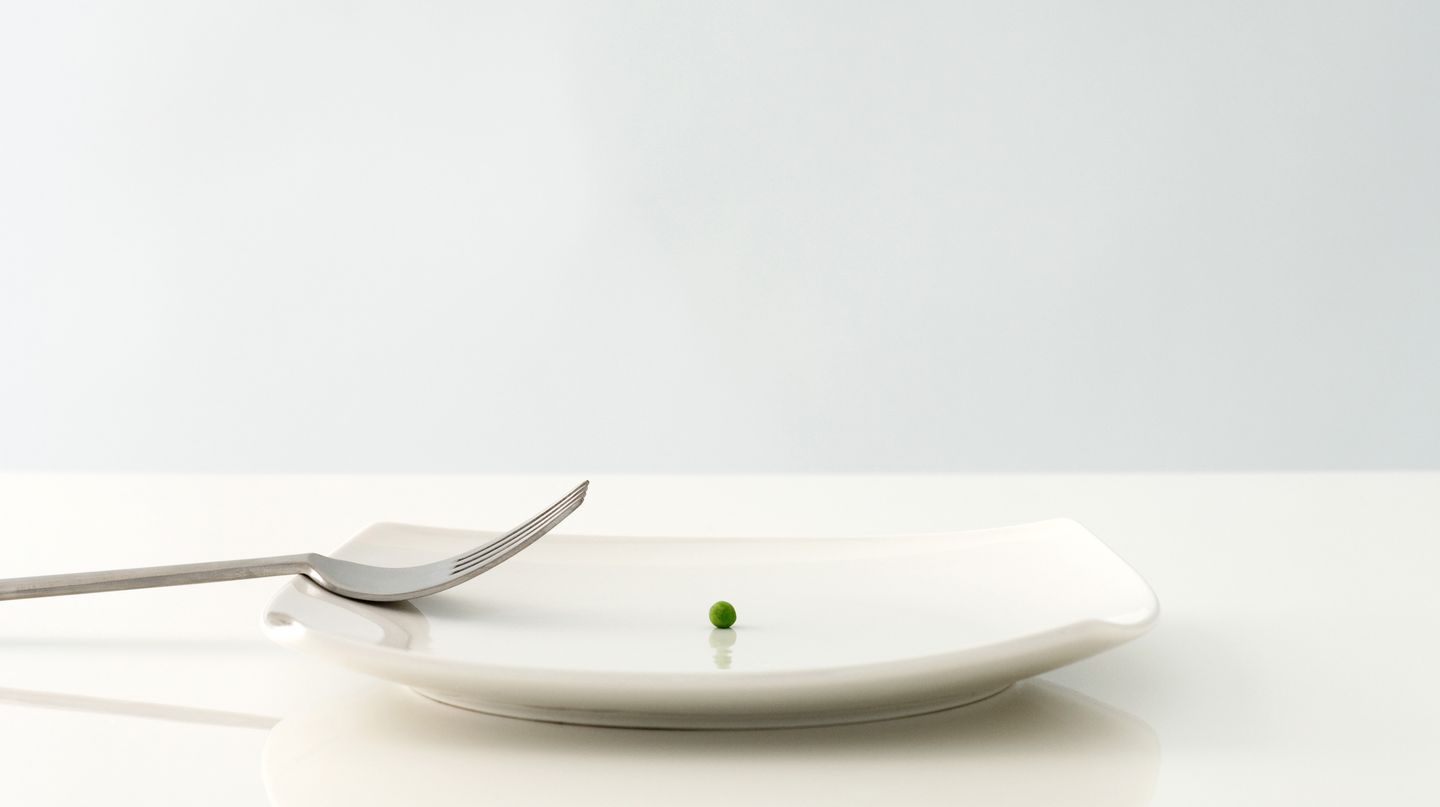 Veganerin: Ein Teller mit einer Erbse
