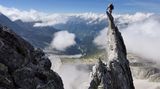 Alpinist auf Felsnadel