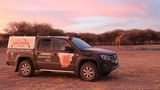 Die Sonnenuntergänge in der Kalahari-Wüste sind malerisch