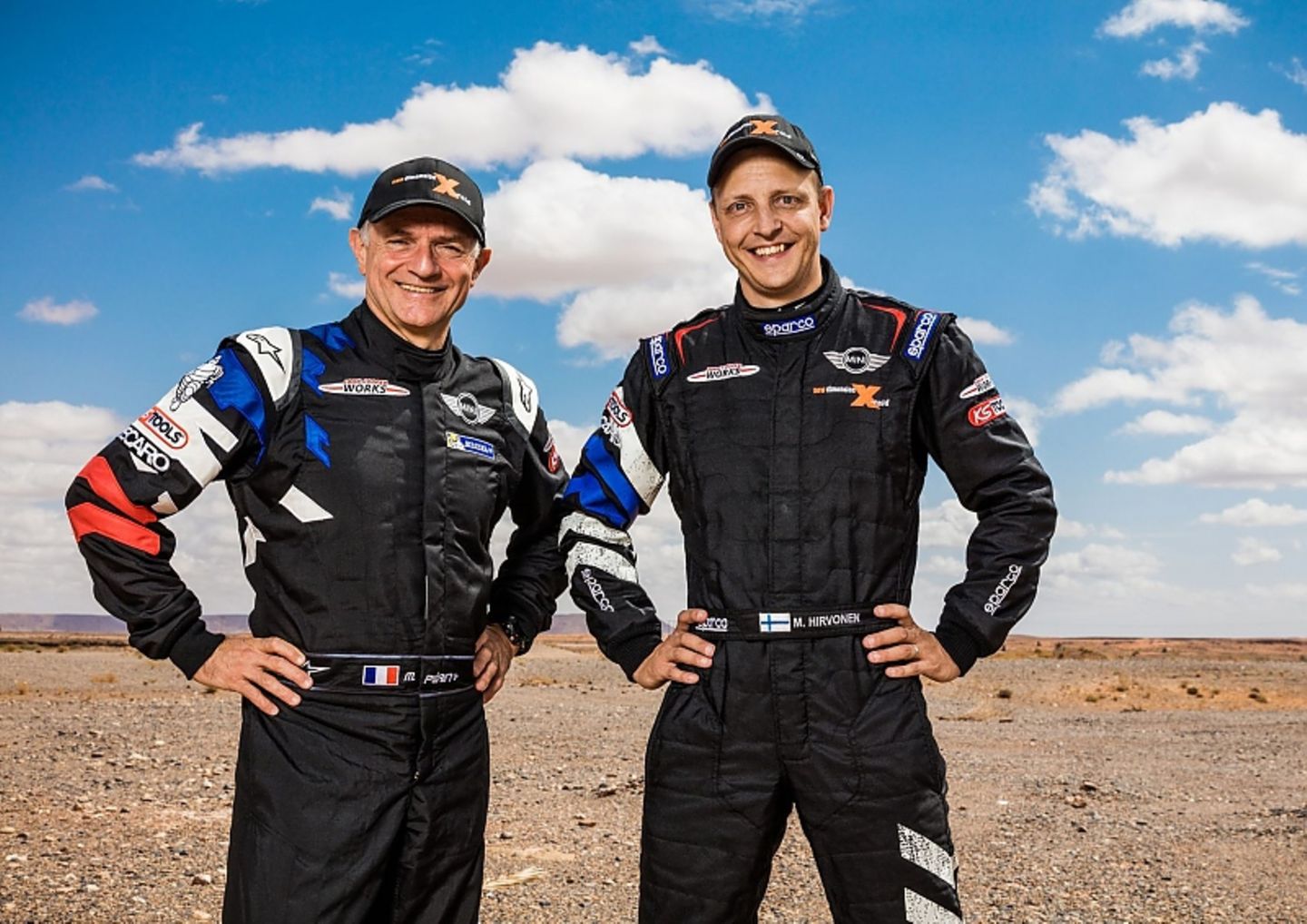 Der finnische Rallye-Superstar Mikko Hirvonen (rechts) und sein Beifahrer Michel Perin.