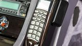 Status-Symbol eines Chefs anno 1995: ein Autotelefon