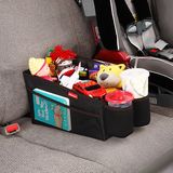 zwischen den Sitzen ist eigentlich egal.