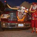 Santa Jim und Raster the Red Nosed Reinsteer 2014 auf der Santa Celebration in Tampa, Florida.