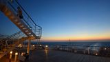 Sonnenuntergang achtern auf der Queen Mary 2