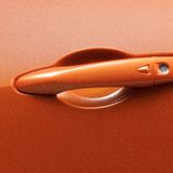 Die vorderen Türgriffe sind in Wagenfarbe gehalten.