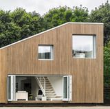 Mit der Holzverschalung sind die Container allerdings nicht mehr zu erkennen.   https://arcgency.com/