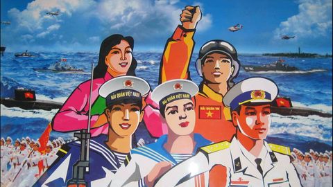 Zu sehen ist ein Plakat, auf dem in bunten Farben frohe vietnamesische Matrosen abgebildet sind.