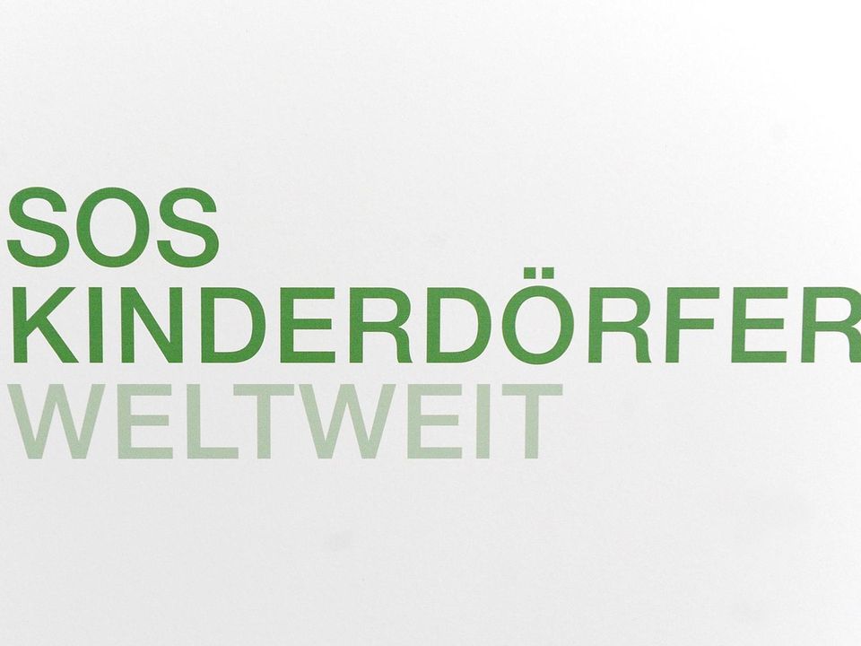 Das Logo der Organisation "SOS-Kinderdörfer weltweit", die sich unter anderem in Syrien engagiert