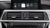 Auch im BMW 430i Cabrio hat das Infotainment-System die Kacheloptik