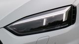 Die angedeuteten Lüftungsschlitze an den Scheinwerfern des Audi RS 5 Coupe sollen an den Rennwagen Audi 90 quattro IMSA GTO erin