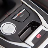Im Peugeot 308 GTi gleich neben dem Startknopf: der Sport-Schalter