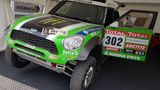 Der Dakar-Sieger aus dem Jahr 2012 vom Team X-raid geht leider bei der Präsentation etwas unter. Schade, fuhr doch der berühmte Stephane Peterhansel in genau diesem Mini den Gesamtsieg quer durch Argentinien nach Chile und Peru ein. 