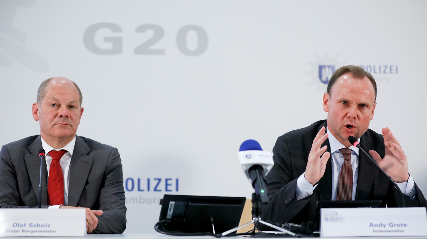 Hamburgs Erster Bürgermeister Olaf Scholz und Innensenator Andreas Grote