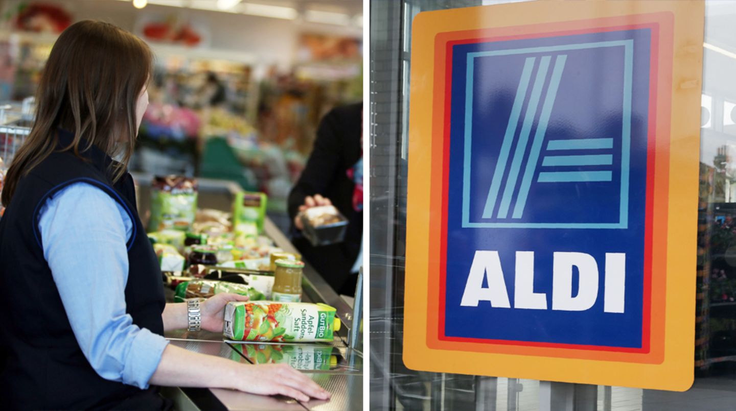 Eine Kassiererin sitzt bei Aldi an der Kasse - aber was verdient sie?