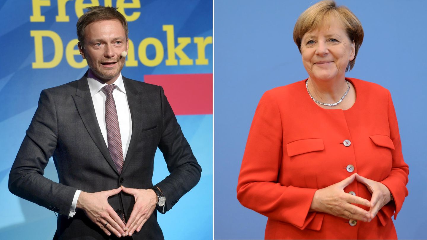 Christian Lindner und Angela Merkel zeigen die Merkel-Raute - Schwarz-Gelb hat die besten Chancen bei der Bundestagswahl