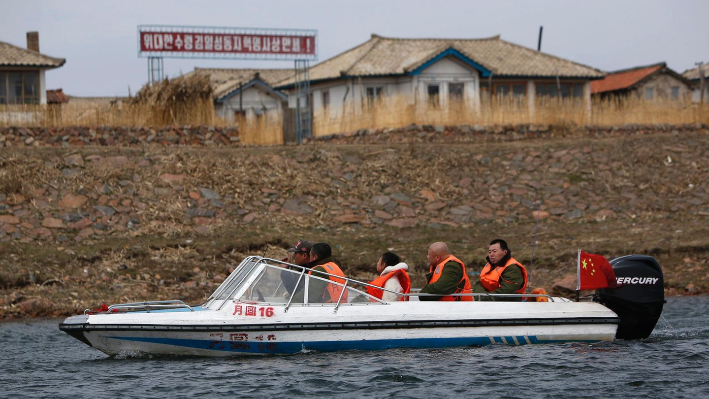 China: Mit dem Motorboot an die Grenze
