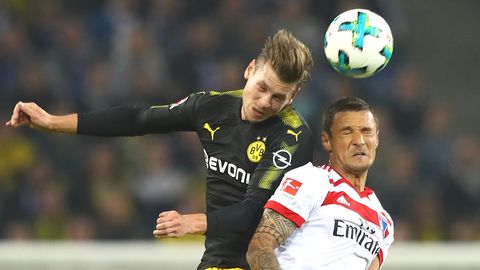 Augen zu und durch: Dortmunds Lukasz Piszczek (l.) und Sejad Salihovic vom Hamburger SV