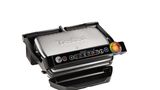 Tefal Optigrill  Sieht nicht so aus, ist aber einer: ein Grill. Genauer ein High-Tech-Grill, der die richtige Garstufe nicht dem Zufall überlässt. Der Tefal OptiGrill erkennt durch einen Sensor automatisch die Dicke des Grillguts und richtet den Grillvorgang danach aus. Über die sechs voreingestellten Grillprogramme passen sich Temperatur und Zeit optimal an die Art des Grillguts an. Die automatische Anzeige gibt im Farbkreis präzise an, in welcher Garstufe sich das Grillgut gerade befindet: egal ob blutig, medium oder "well-done". So werden Burger, Geflügel, Sandwiches, Würstchen, Steaks und Fisch stets punktgenau gegrillt und es bleibt mehr Zeit für die Gäste. Mit einer Grillfläche von 600 Quadratzentimetern lassen sich bis zu vier kleine Portionen gleichzeitig grillen.