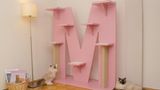 Hier die 2-D-Variante des "M" in rosa.