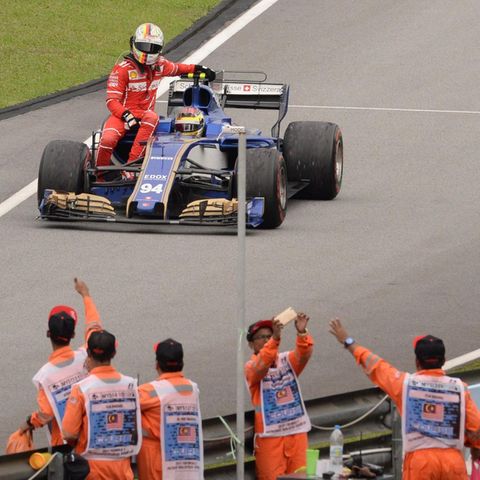 Sebastian Vettel Pascal Wehrlein Ferrari