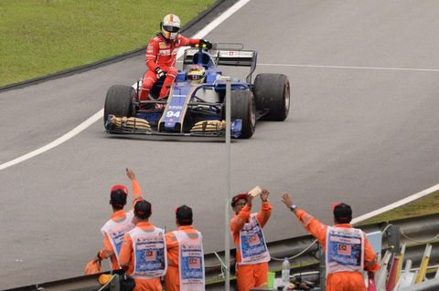 Sebastian Vettel Pascal Wehrlein Ferrari
