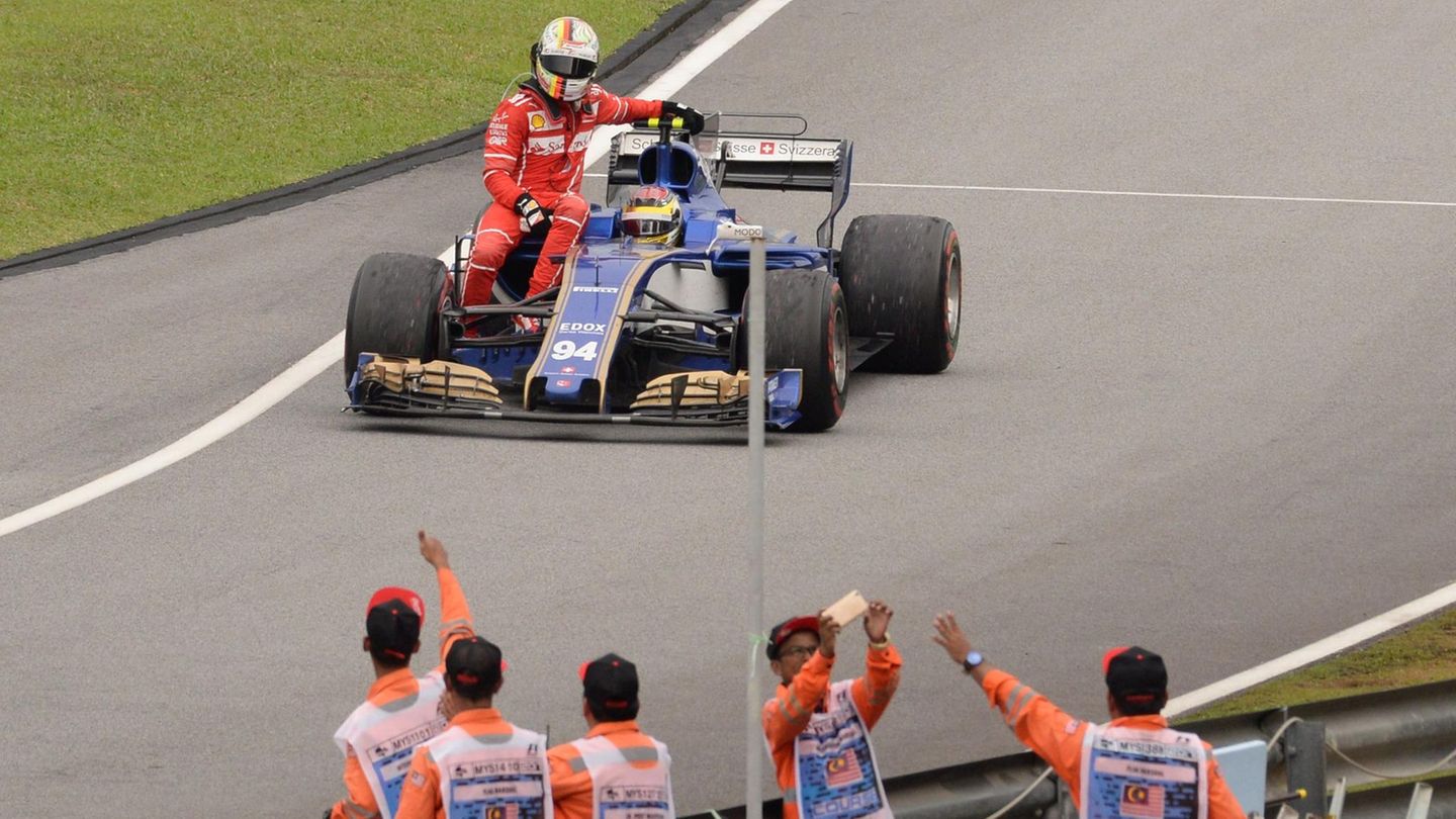 Sebastian Vettel Pascal Wehrlein Ferrari