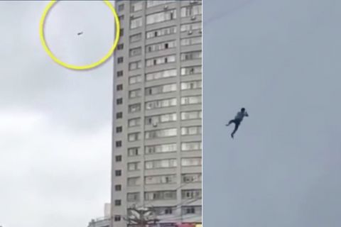 Drahtseilakt in China: Mann flieht an Telefonleitung aus Hotel - der Grund ist völlig absurd