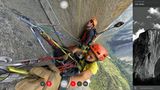850 Klettermeter sind bereits geschafft: Am Standplatz hängt Caro North die Seile mit einem Karabiner in die Bohrhaken ein und sortiert das Material. Aus dem Rucksack von Tony Brown ragt der an der Stange befestigte Kamerawürfel.