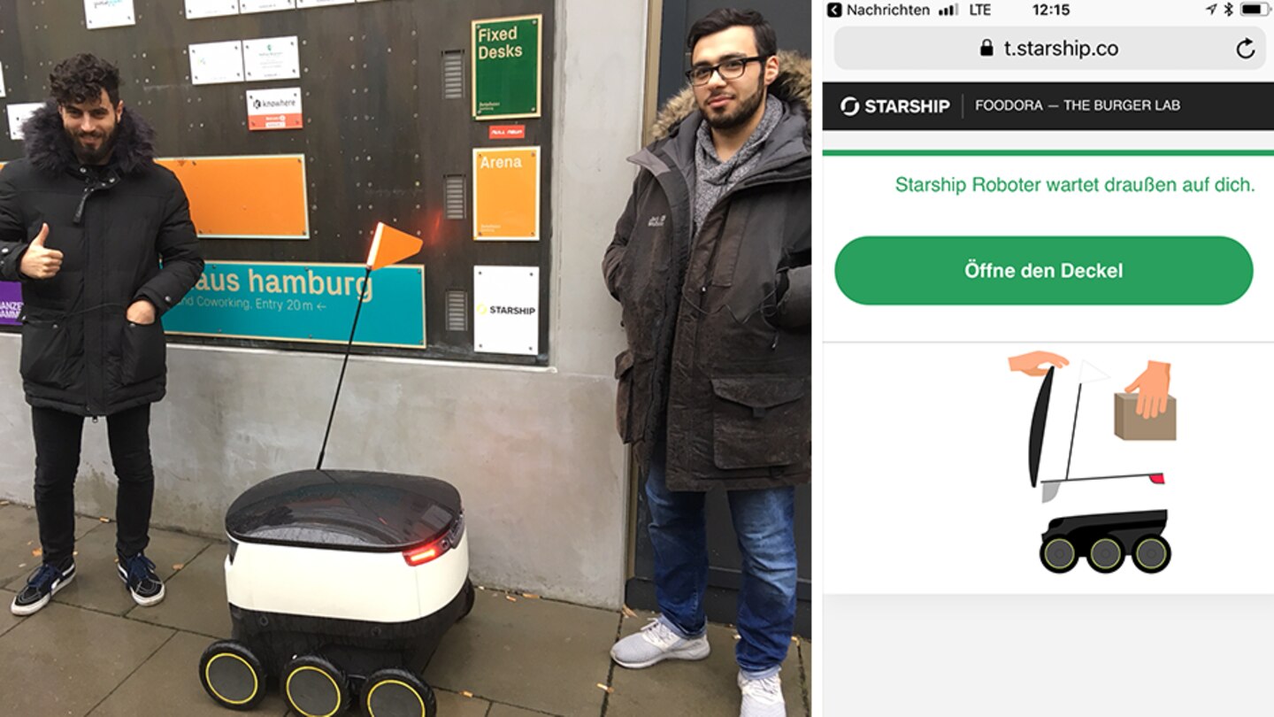 Ein Lieferroboter steht zwischen zwei Menschen