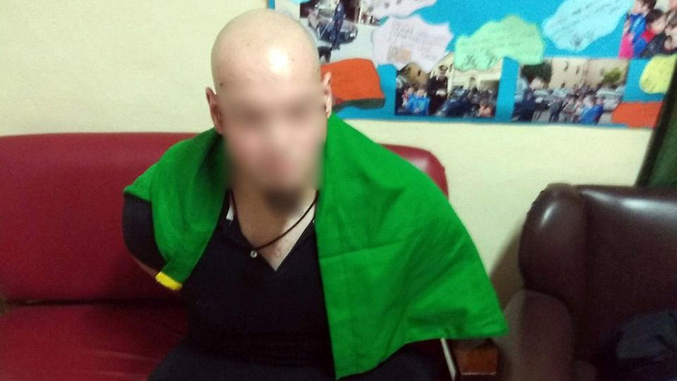Luca Traini nach seiner Festnahme: Die italienische Flagge ruht auf seinen Schultern